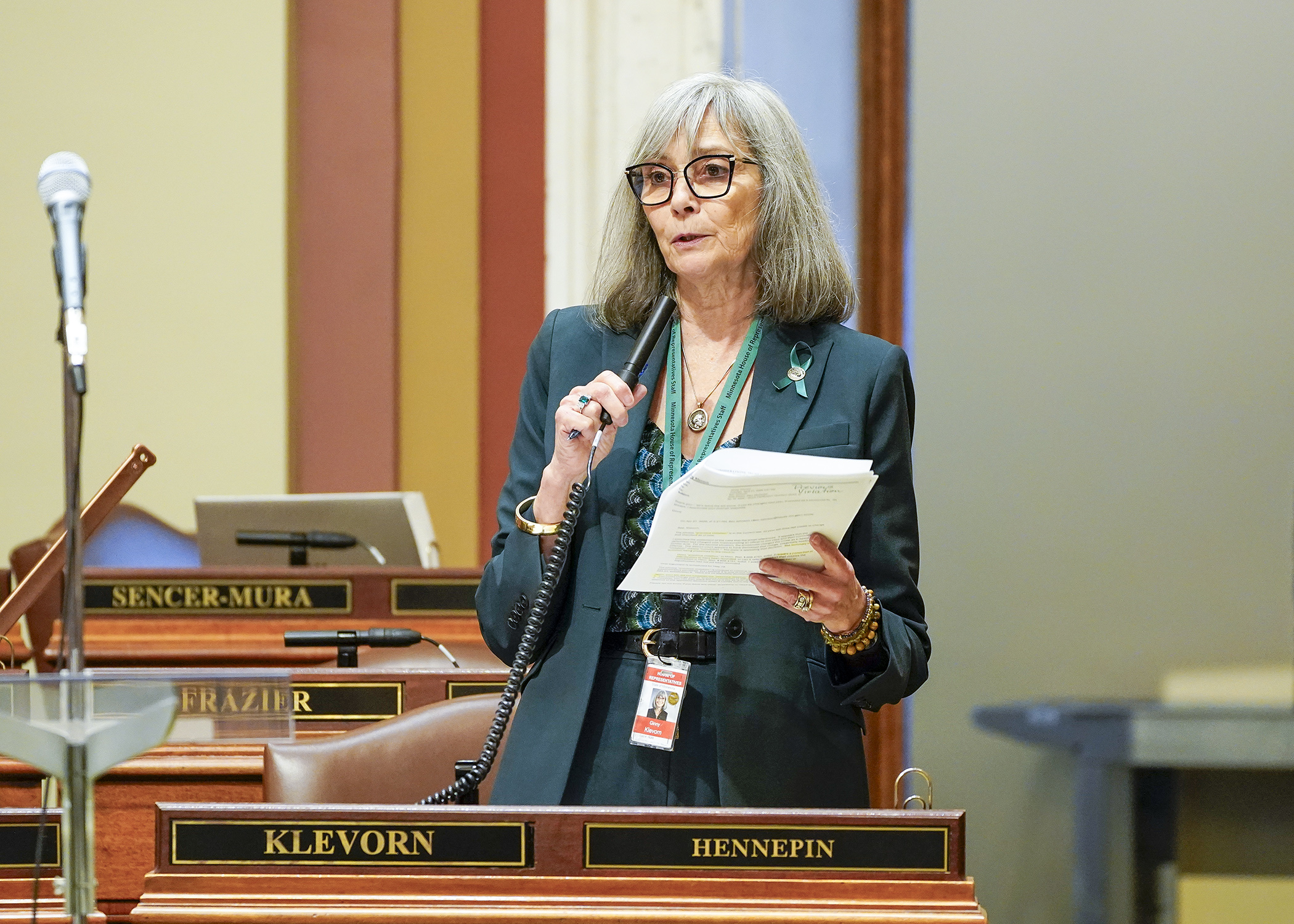Rep. Ginny Klevorn presents HF3404 on the House Floor April 23. In part, the bill would increase the penalty for impersonating a peace officer and make it a crime to impersonate a peace officer while possessing a firearm. (Photo by Andrew VonBank)